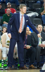 Dave Richman directs traffic from the sidelines in the semifinals of the Summit League tournament against Oral Roberts.