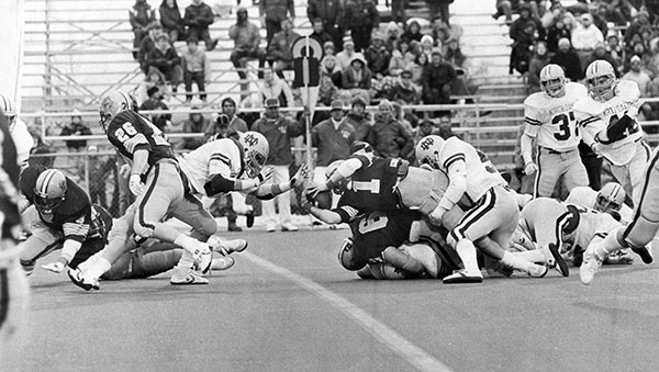 Jeff Bentrim extends over the goal line for another Bison touchdown in the NDSU-UND football game in 1985.