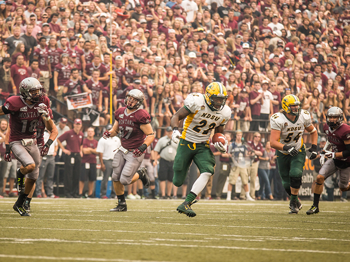 North Dakota State's King Frazier runs for a first down in the FCS Kickoff against Montana