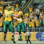 Chase Morlock and Colin Connor celebrate a touchdown