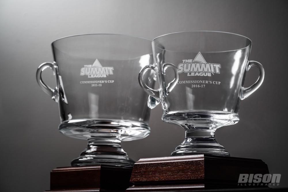 The two Summit League Commissioner Cups NDSU has won sit in the front of the NDSU Athletics office at the SHAC